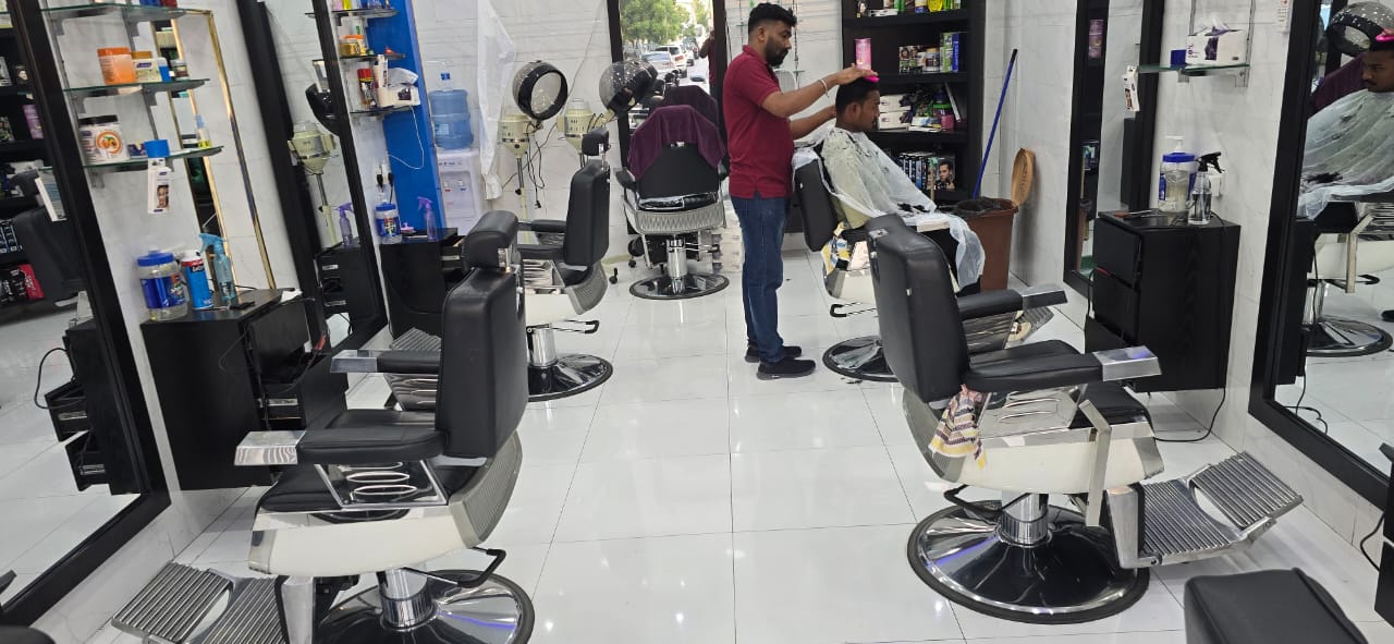 Golden Bow Gents Salon reception area with comfortable seating.